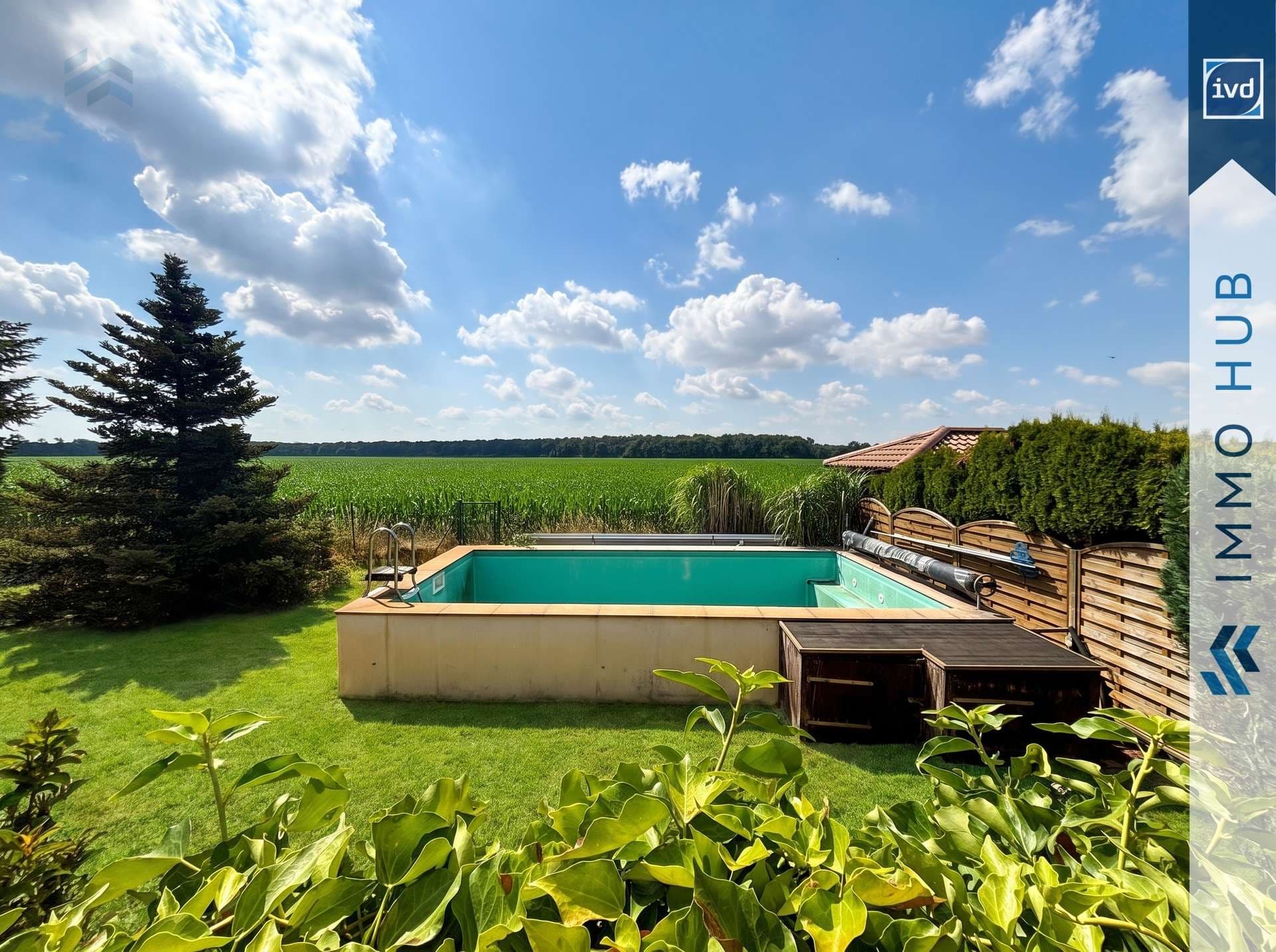 Großzügiges Zweifamilienhaus mit Einliegerwohnung, Pool und unverbaubarem Naturblick – Bild 12