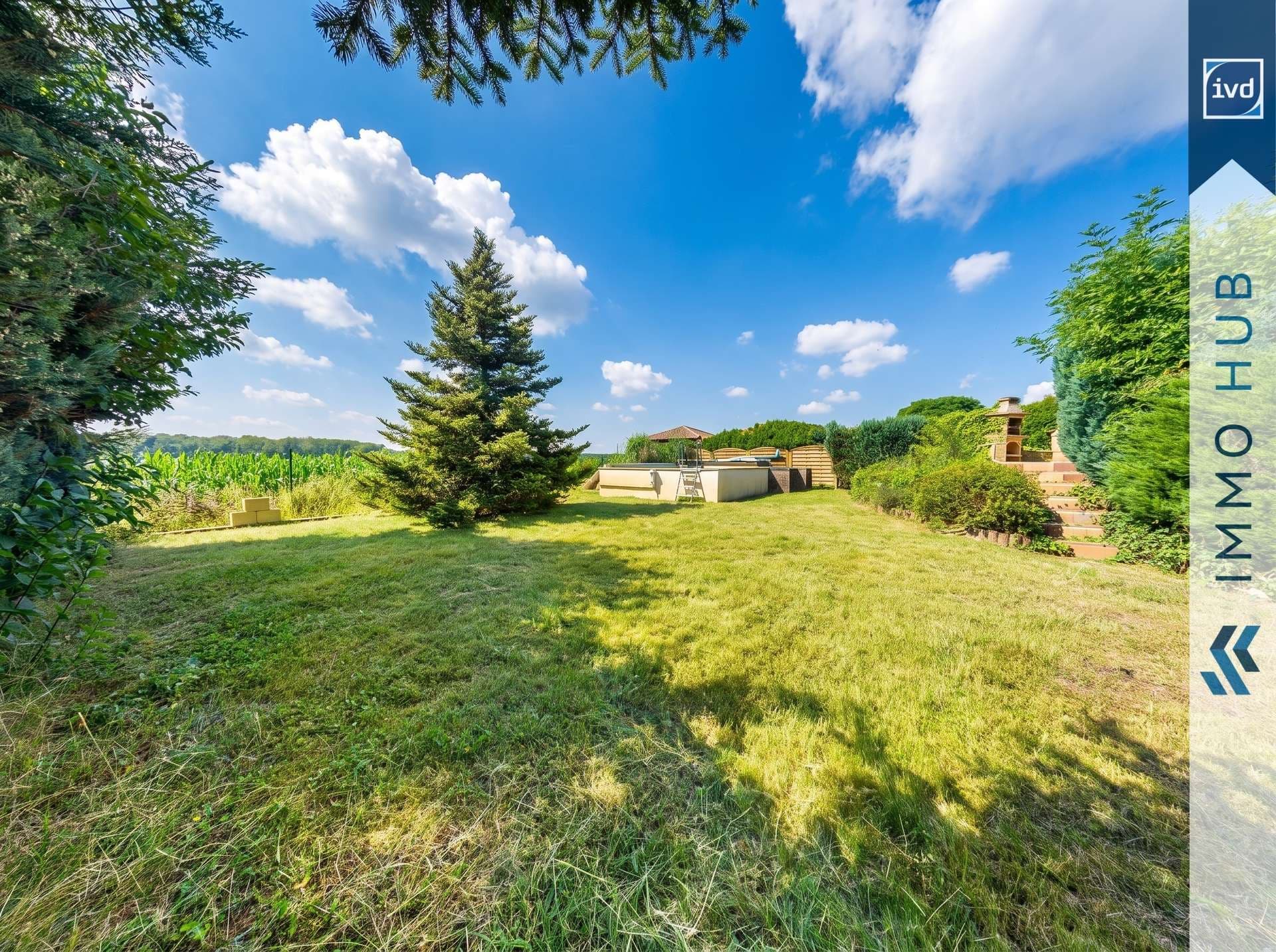 Großzügiges Zweifamilienhaus mit Einliegerwohnung, Pool und unverbaubarem Naturblick – Bild 15